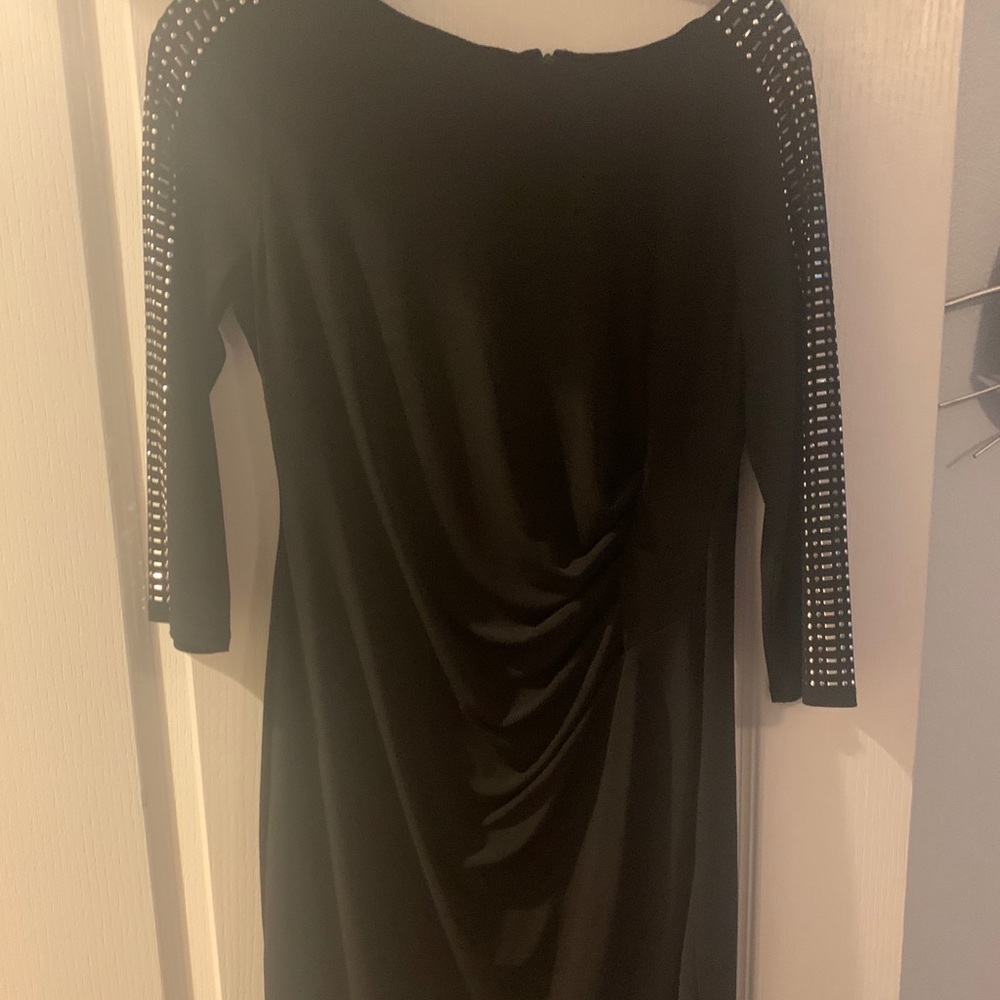 Black dress with metal embellishments
